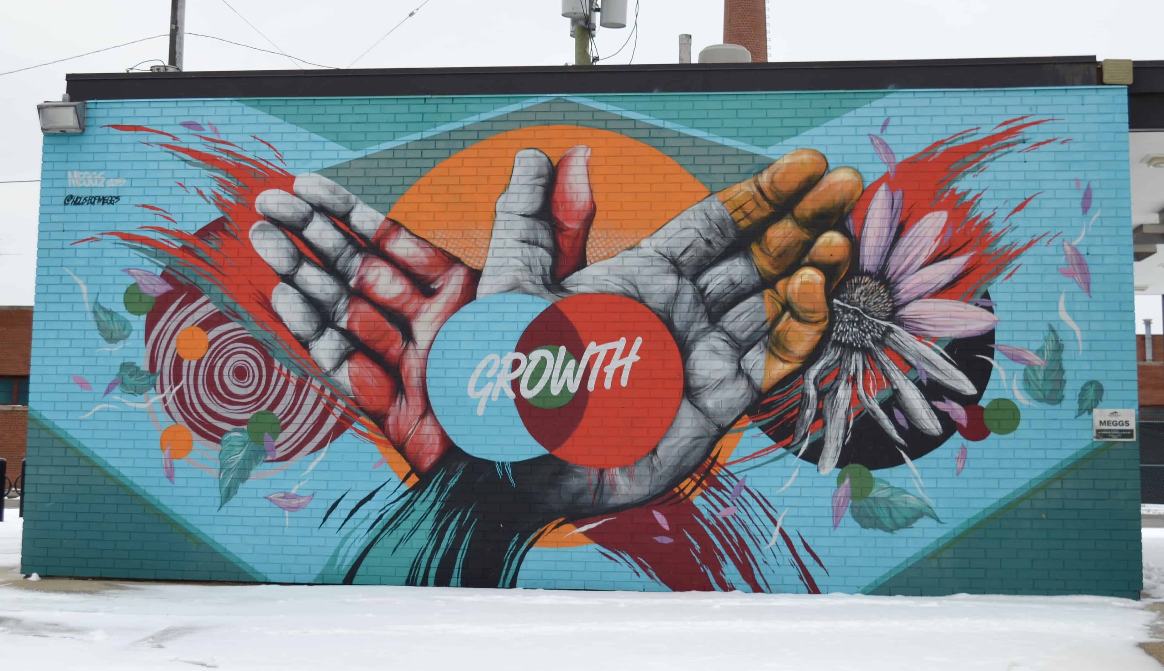 growth hands art mural detroit