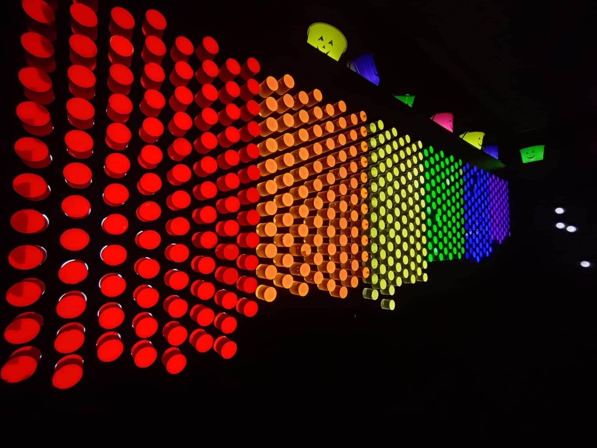 colorful light peg wall Color Factory in Houston